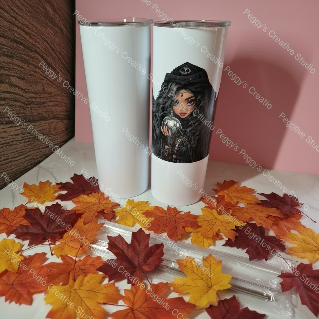 Two white stainless steel slim tumblers with custom artwork surrounded by autumn maple leaves