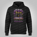 Black pullover hoodie with Honoring Our Incredible Nurses purple and gold graphic design on the front