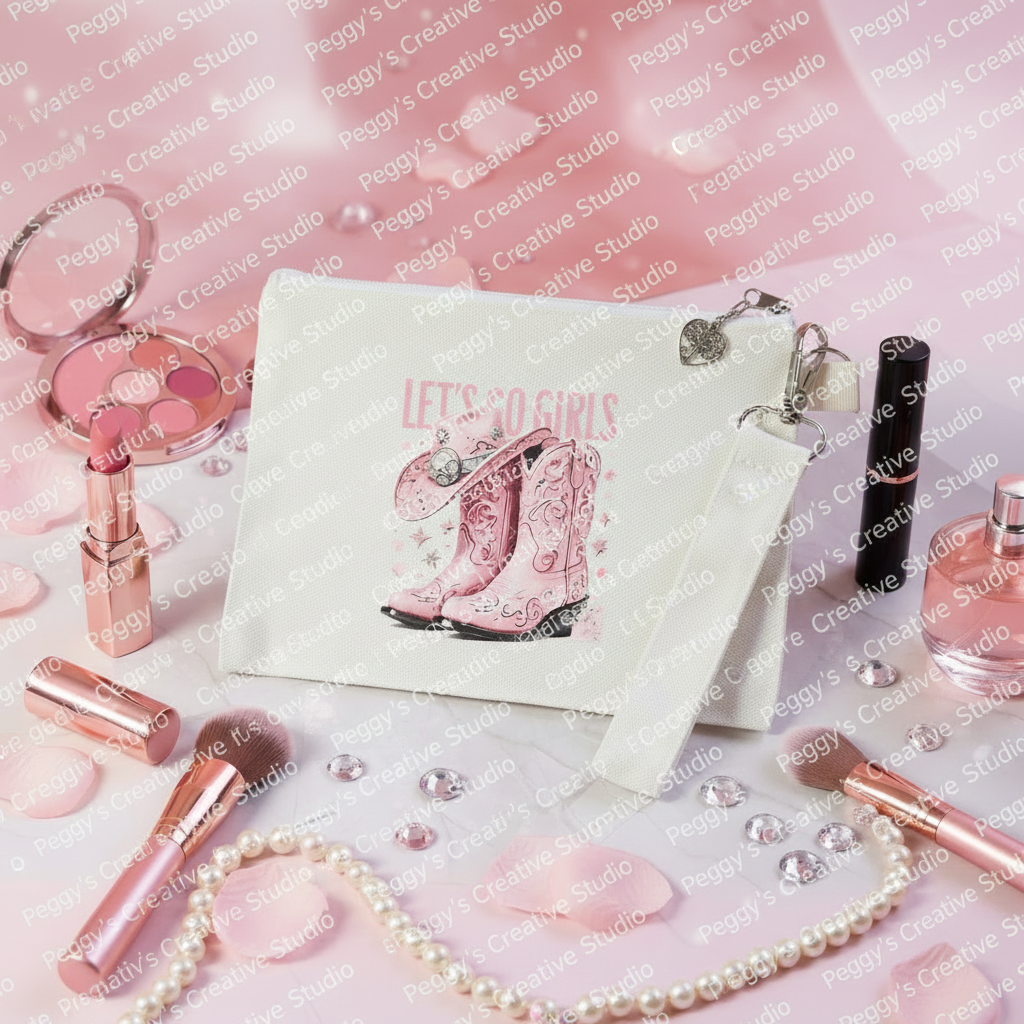 White canvas custom makeup case with Let's Go Girls design surrounded by feminine makeup items, rose petals and sparkles