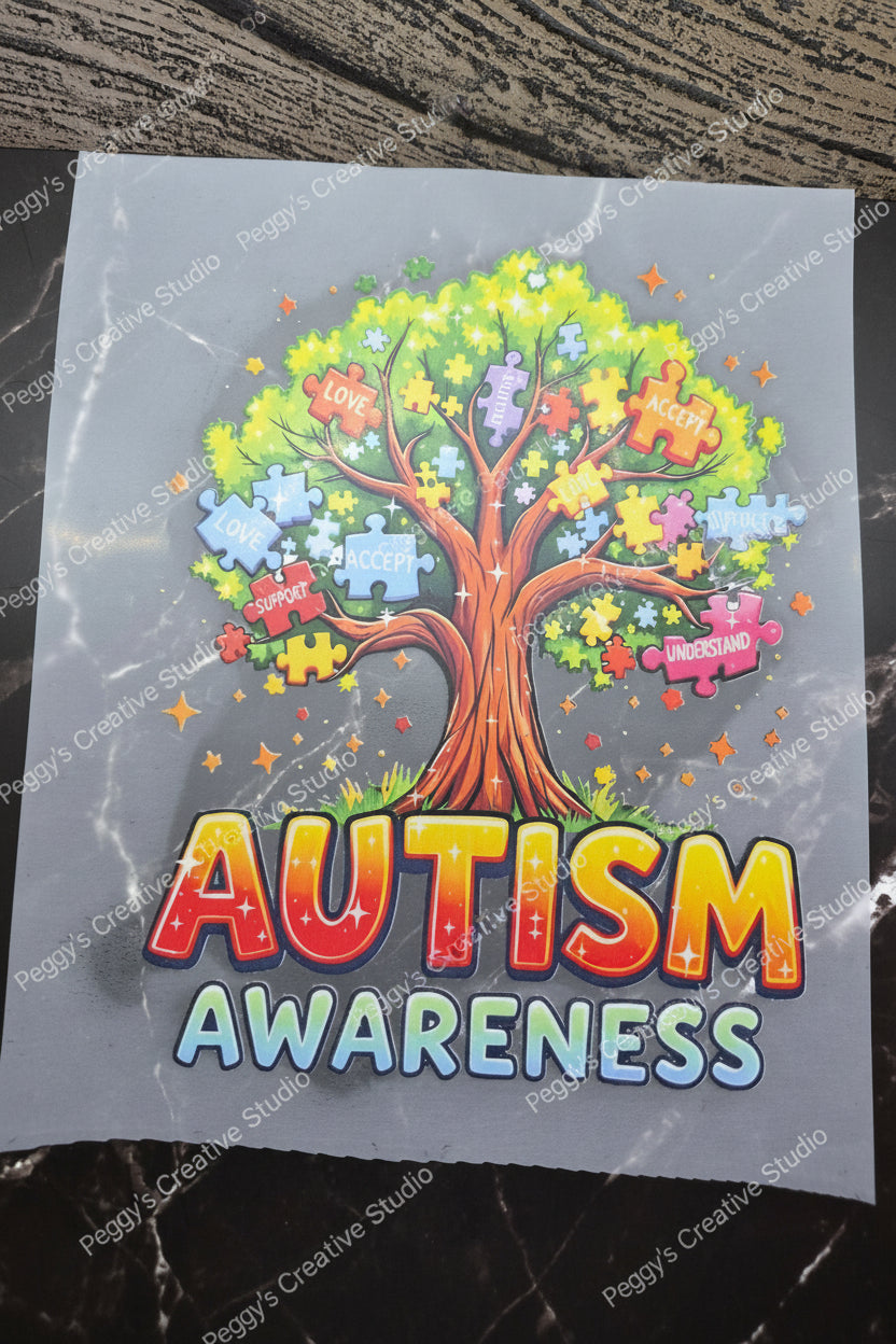 Autism awareness tree with puzzle pieces design